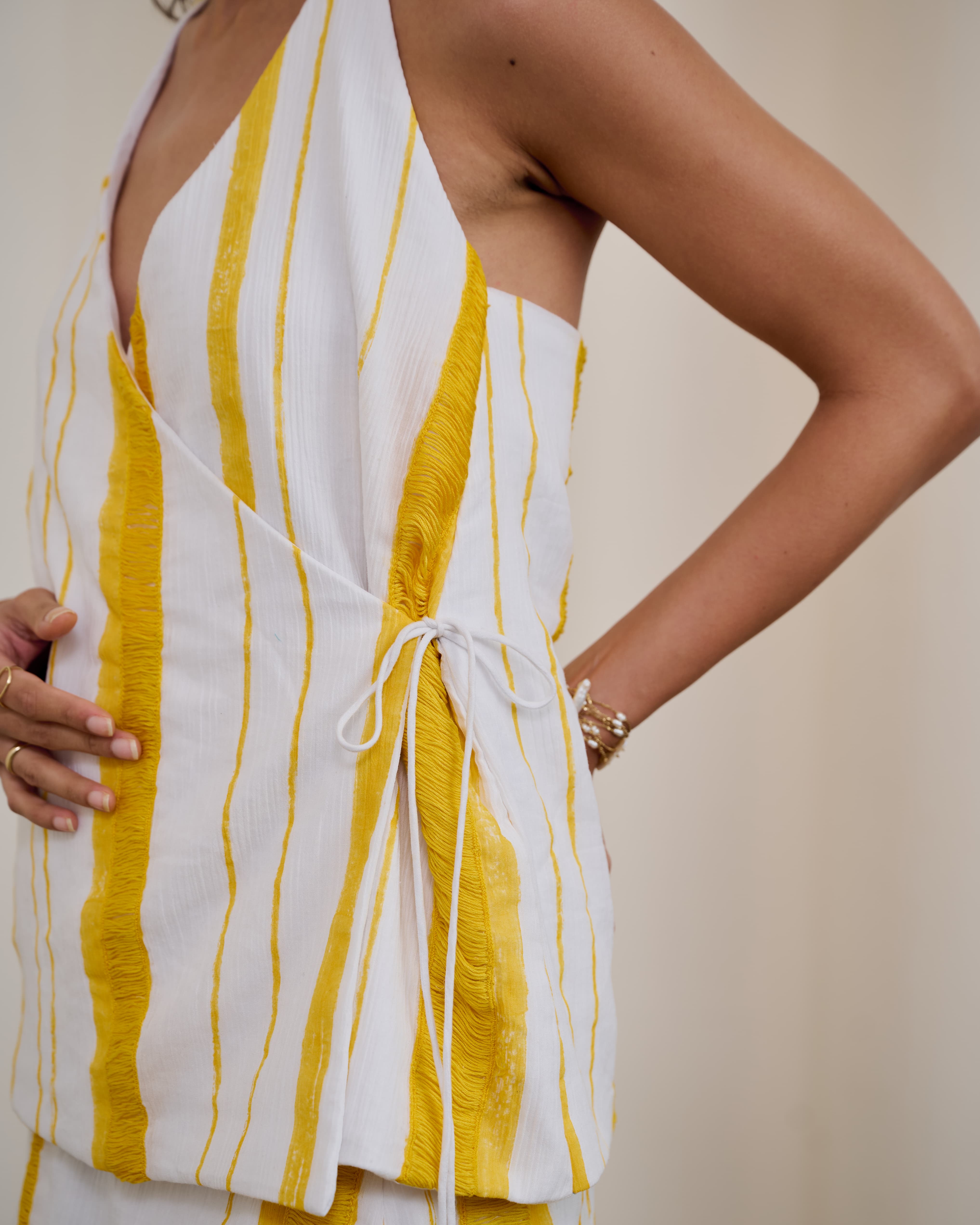 Stripped side tie top